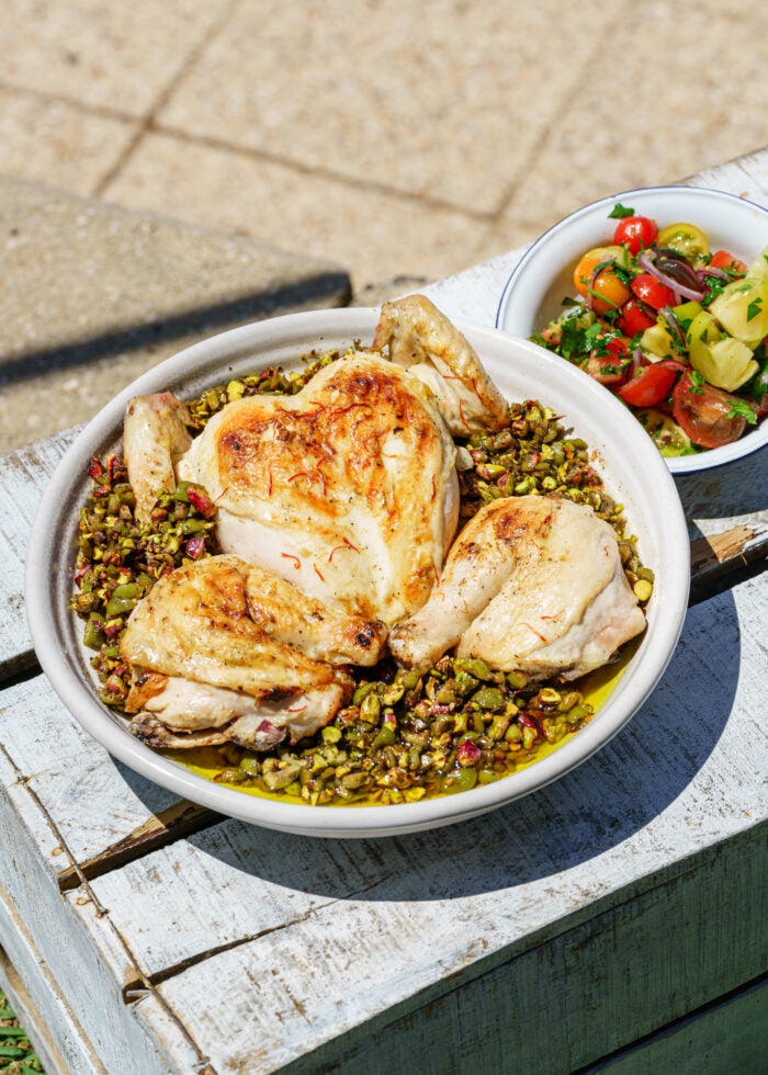 Grilled Saffron Chicken w/ Marinated olives and Pistachios + Lime Tomato Salad